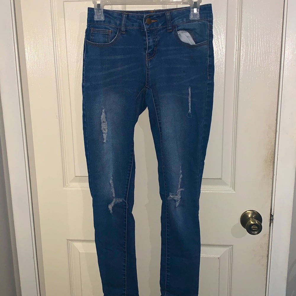 Caution to the wind skinny ripped jeans